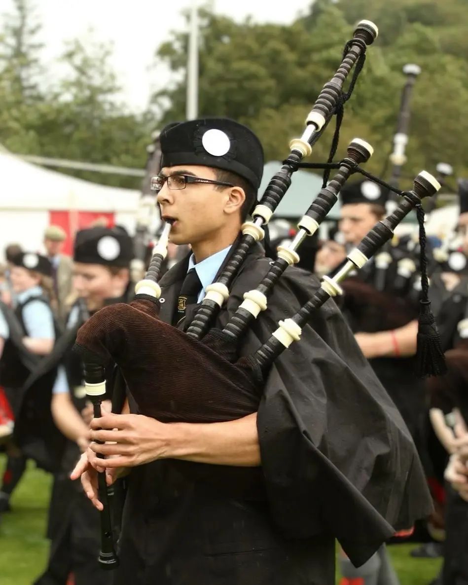 Aaron McInnes marching as Pipe Sergeant with Oban High School Pipe Band